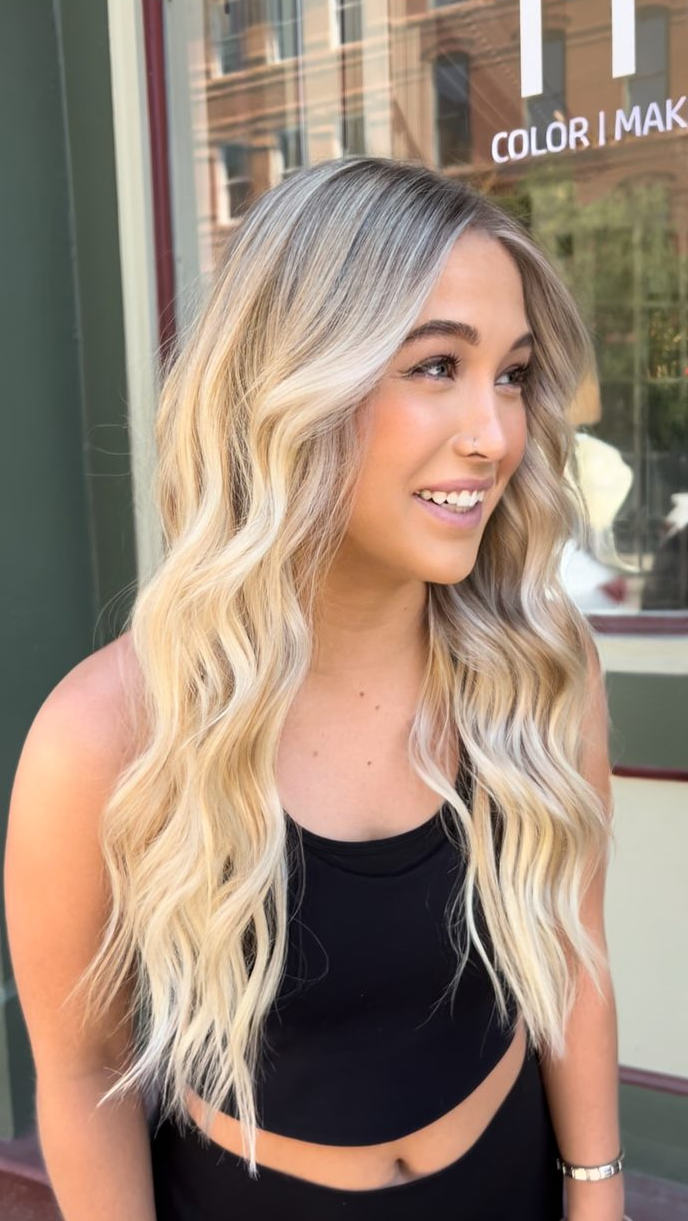 Balayage hand-tied hair extensions with blonde beach waves by Alix at Fluff Hair Extensions Studio