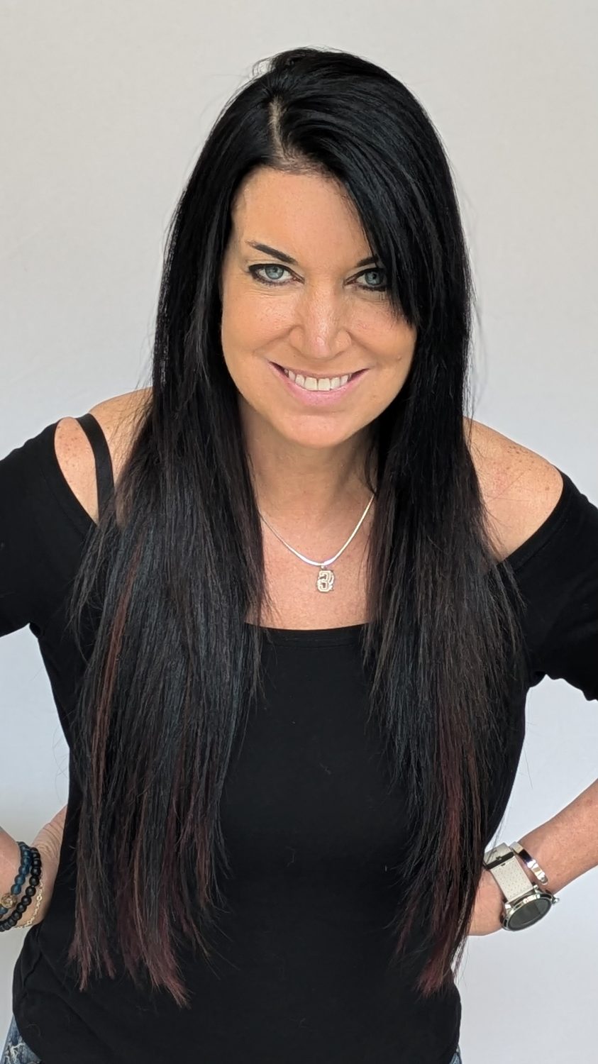 Natural black K-tip hair extensions with sleek length and subtle dimension by Haley at Fluff Hair Extensions Studio