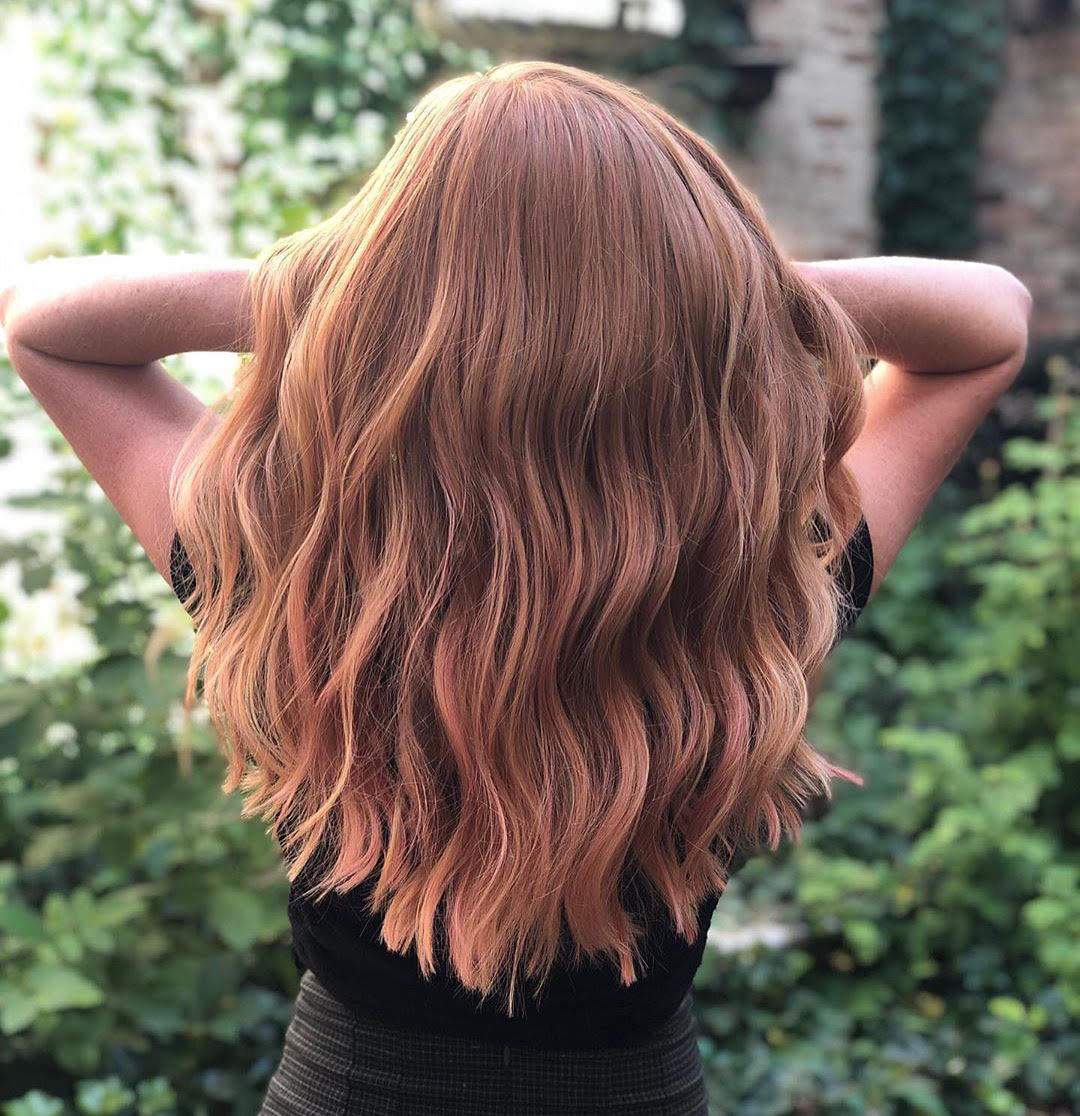 Rose gold hand-tied weft hair extensions by Haley at Fluff Hair Extensions Studio