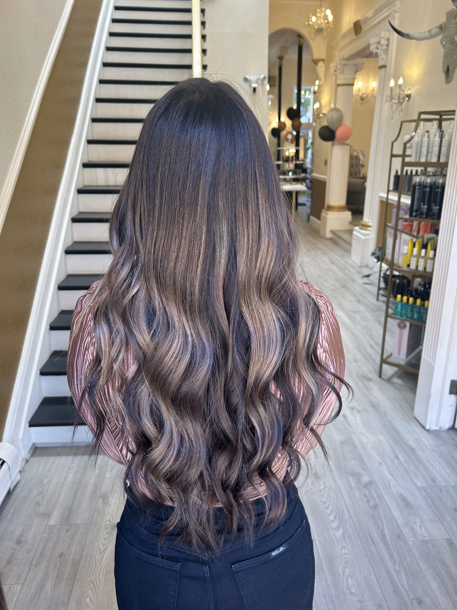Brunette balayage hair extensions — long wavy custom color match at Fluff Studio